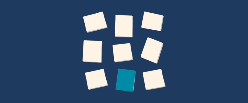 Nine identical small rectangles at varied angles, one of them teal